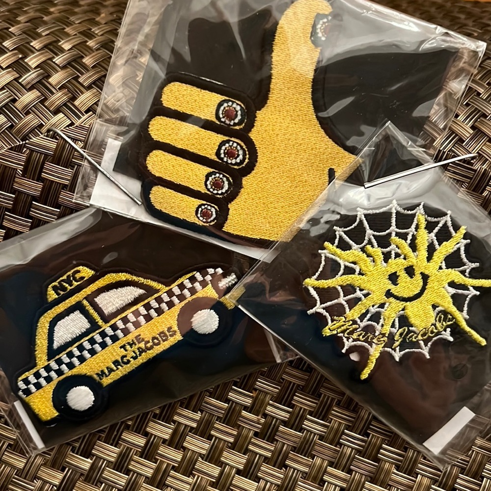 Marc Jacobs taxi, thumbs up and spider web patches